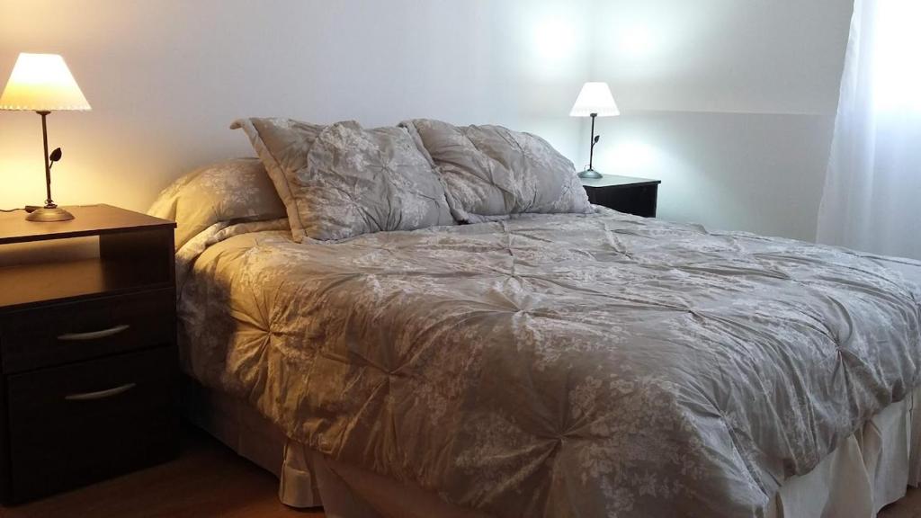 Postel nebo postele na pokoji v ubytování Alas Pampas