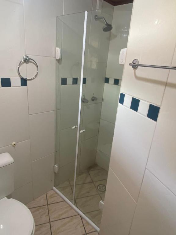 Um banheiro em Hotel D'Luz