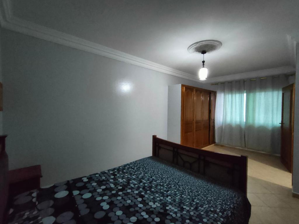 Letto o letti in una camera di La Luna Rentals