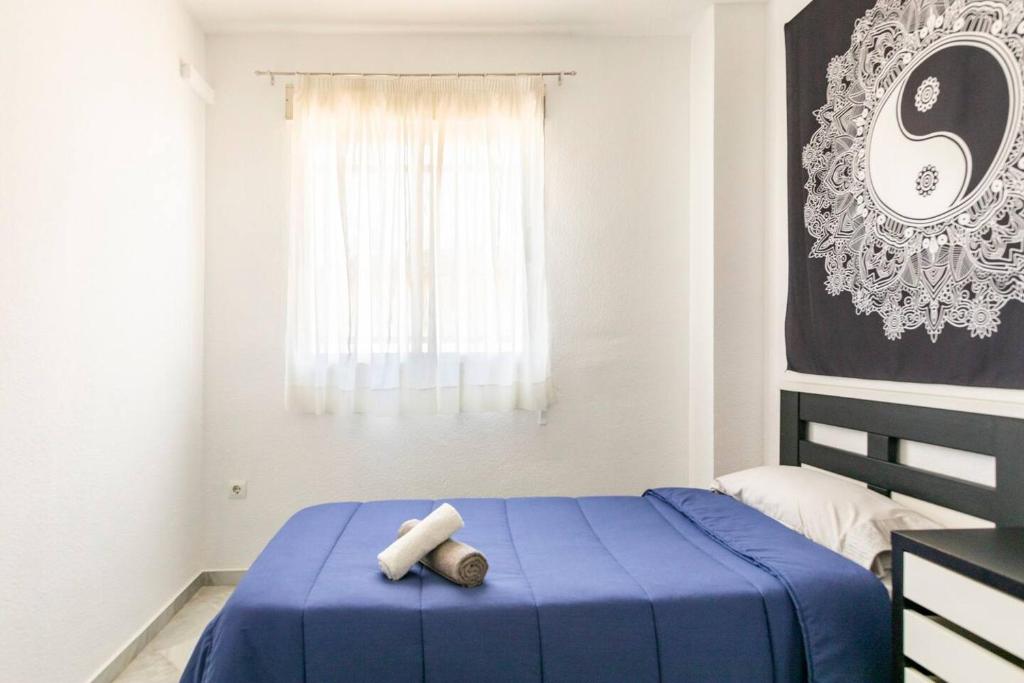 Postel nebo postele na pokoji v ubytování Sevillabienestar
