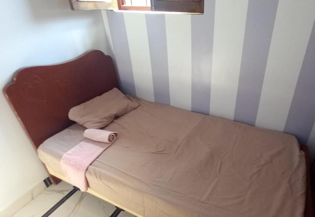 Postel nebo postele na pokoji v ubytování Zohra Guest House