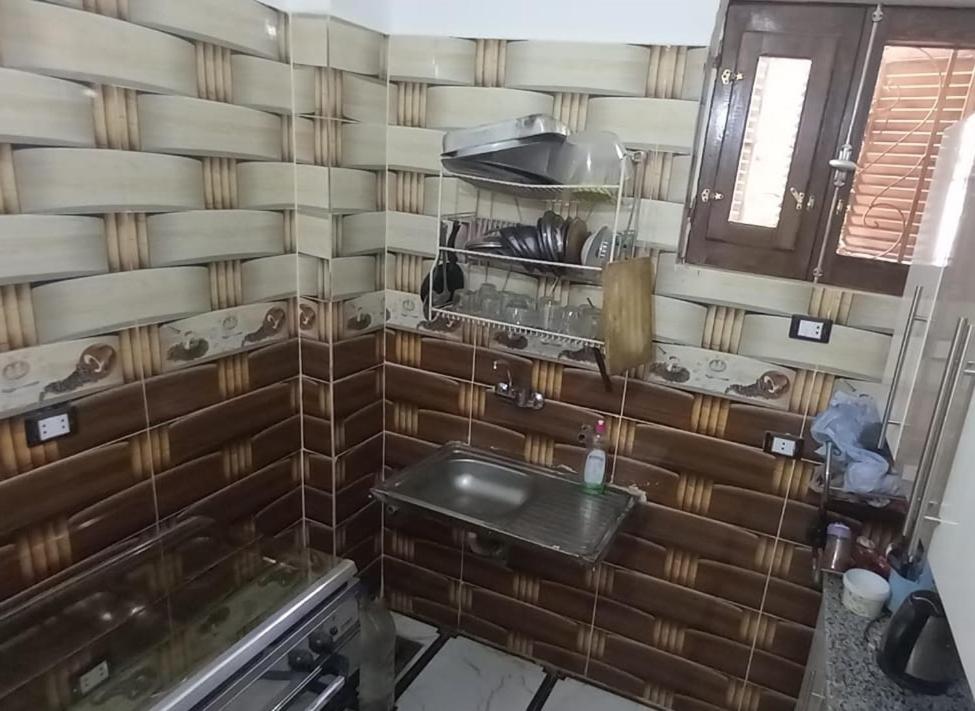 Kuchyň nebo kuchyňský kout v ubytování Zohra Guest House