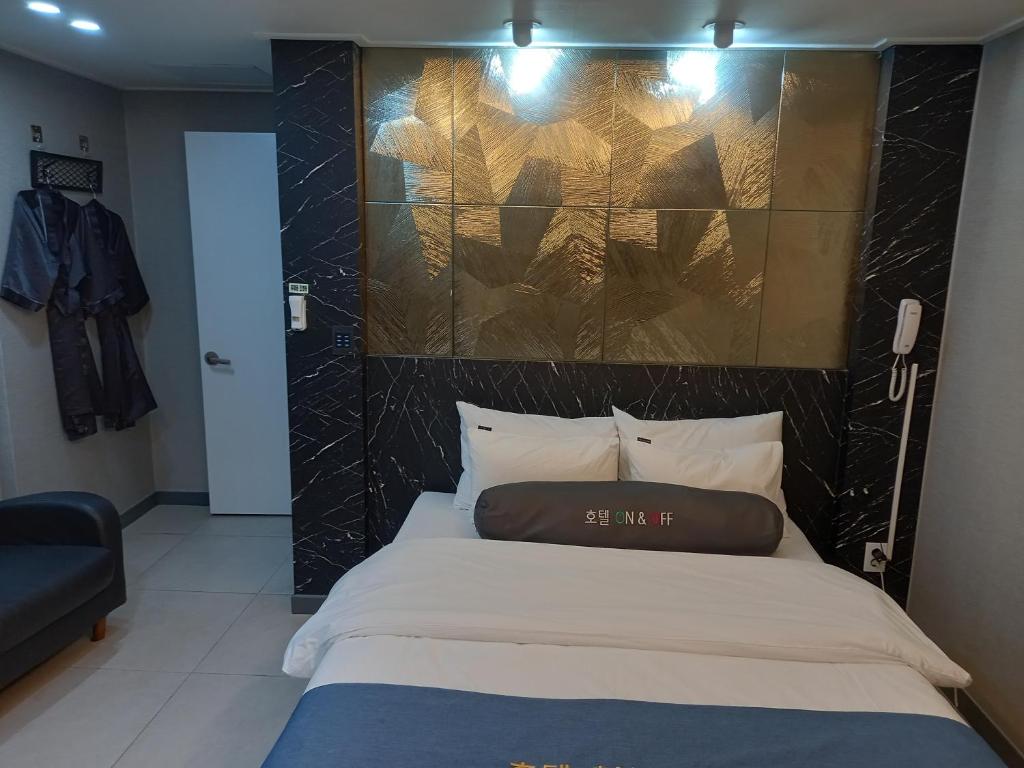 Postel nebo postele na pokoji v ubytování On & Off Hotel Bupyeong