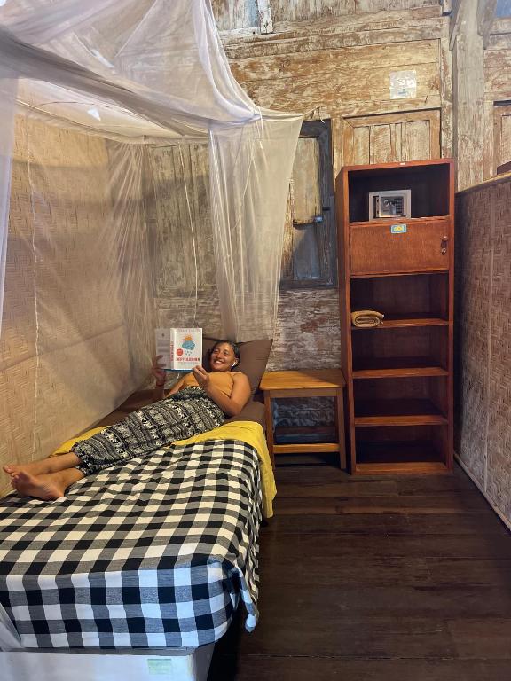 Postel nebo postele na pokoji v ubytování Seabreeze Hostel Bali