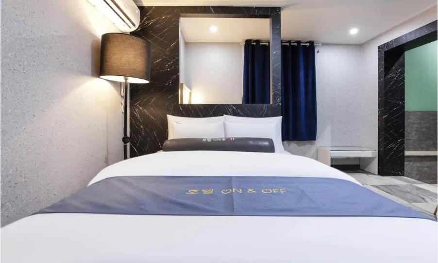 Postel nebo postele na pokoji v ubytování On & Off Hotel Bupyeong