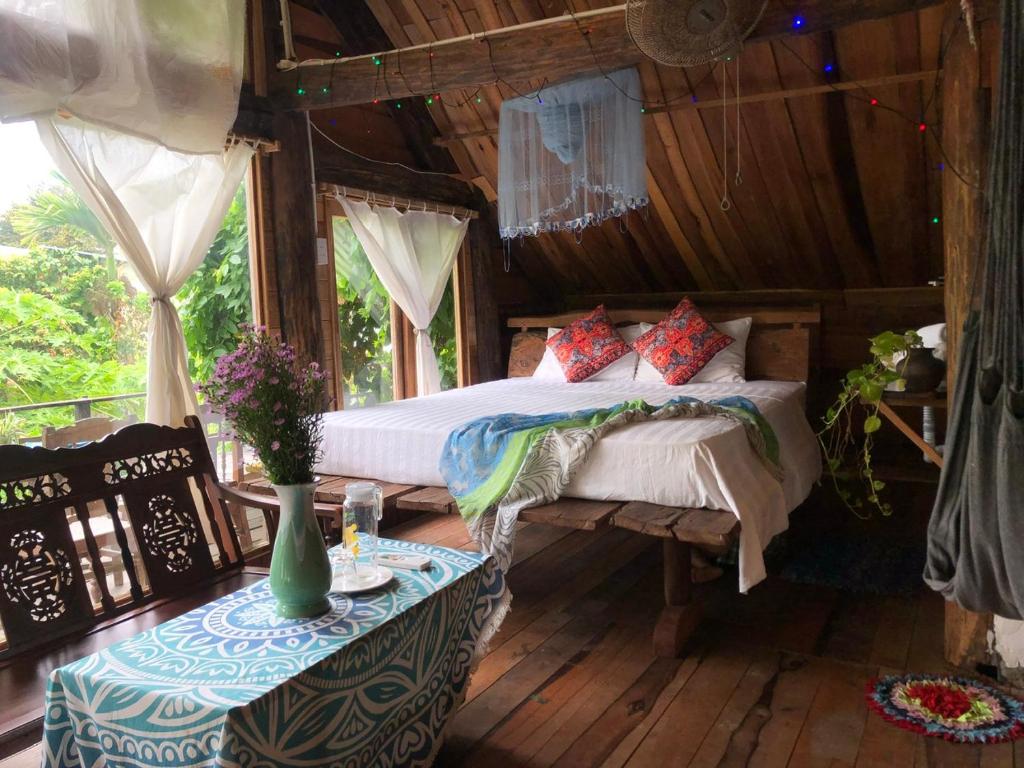 Giường trong phòng chung tại Hoi An Mercy homestay