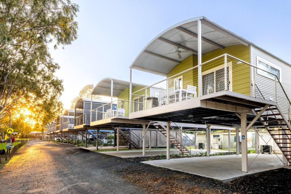 a building with balconies on the side of a street at BIG4 Deniliquin Holiday Park in Deniliquin