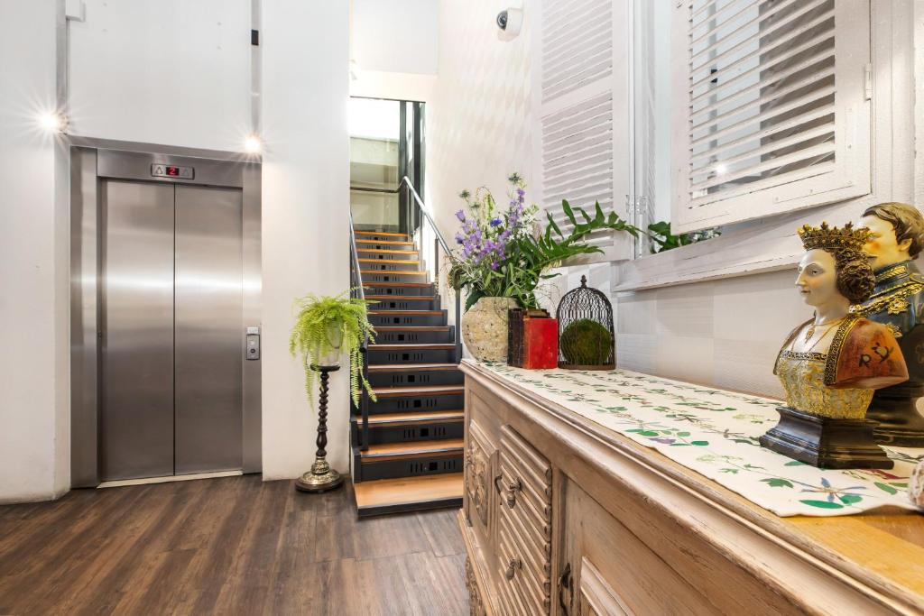 Kuchyň nebo kuchyňský kout v ubytování Hotel 115