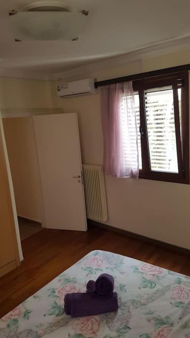 Postel nebo postele na pokoji v ubytování Κεντρικό διαμέρισμα