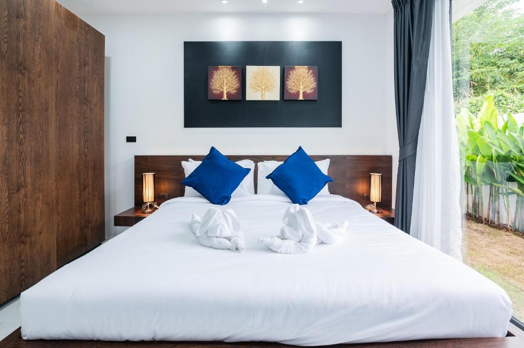Mango Hill Residenceにあるベッド