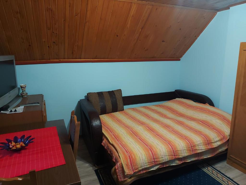 Postel nebo postele na pokoji v ubytování Kuca - STUDIO
