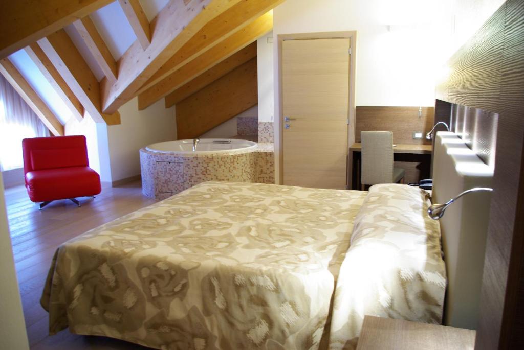 Postel nebo postele na pokoji v ubytování Grand Hotel Miramonti