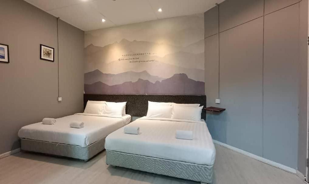 Postel nebo postele na pokoji v ubytování Jabez Resort Kundasang