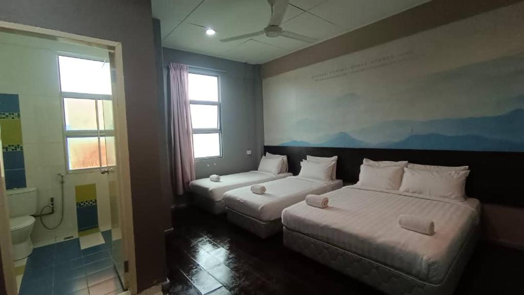 Postel nebo postele na pokoji v ubytování Jabez Resort Kundasang