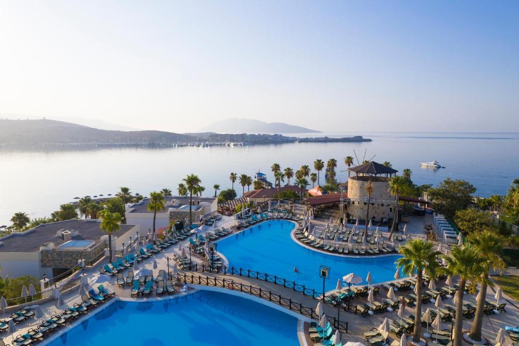 an aerial view of a resort with a large pool at Selectum Colours Bodrum in Gümbet