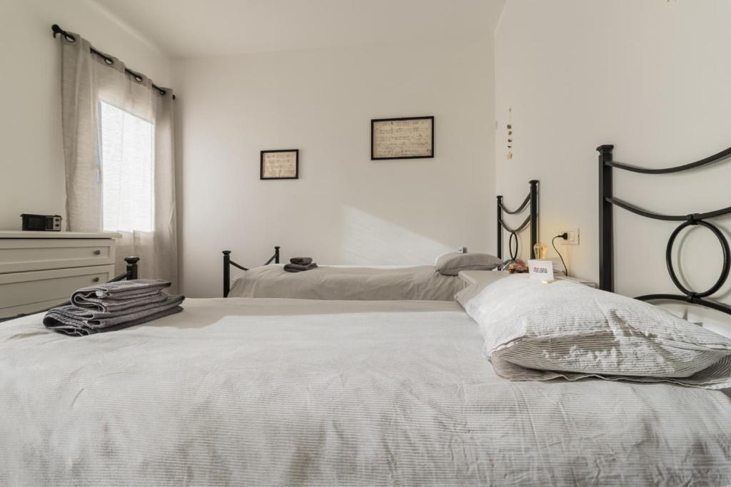 A bed or beds in a room at 45 minutes to Venice - By Flora