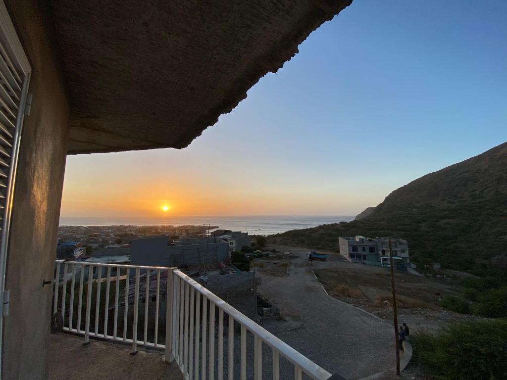 a sunset from the balcony of a house at Casa Graciosa in Tarrafal