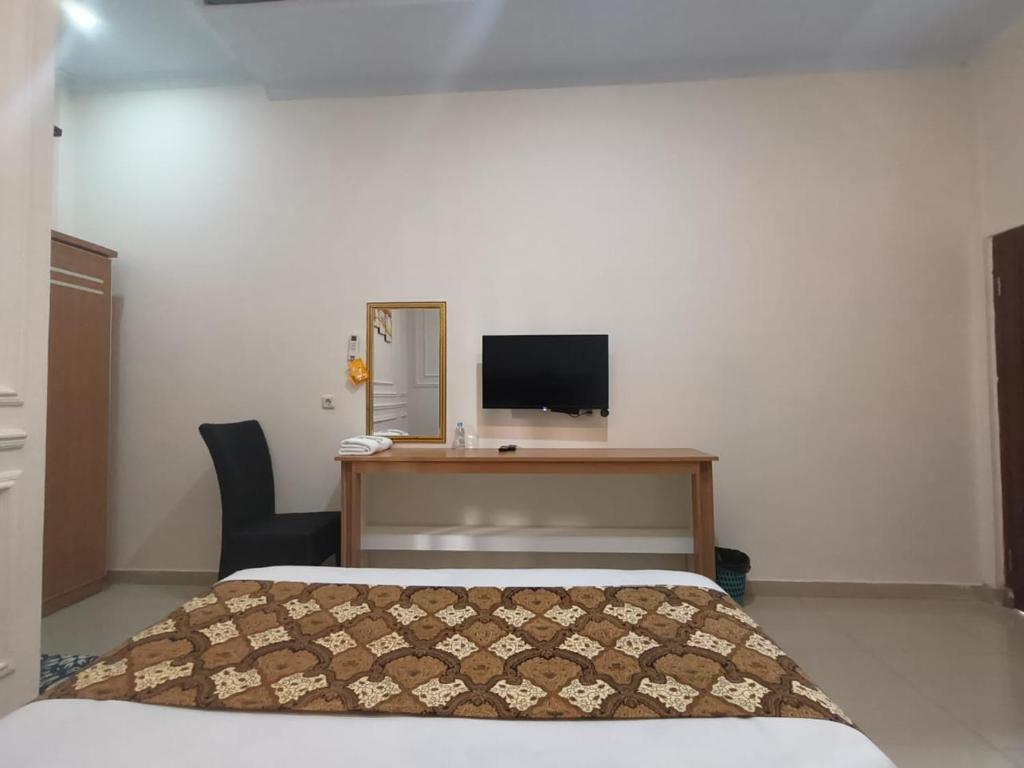 TV a/nebo společenská místnost v ubytování D'Exclusive Guest House