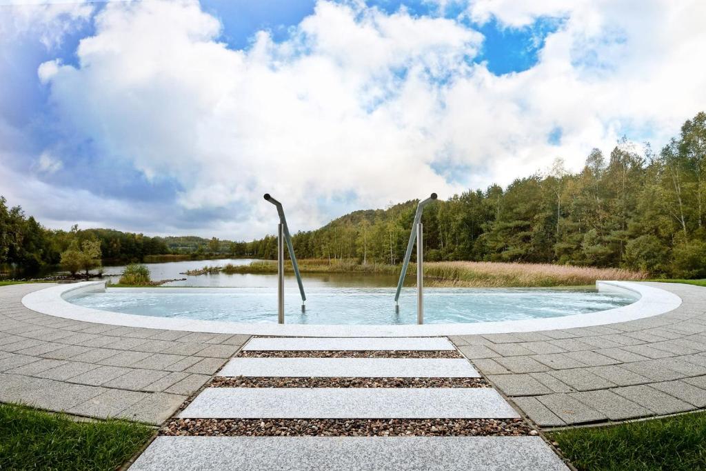 Bazén v ubytování Het Zonnetje -Vakantiewoning en Bed and Breakfast nebo v jeho okolí