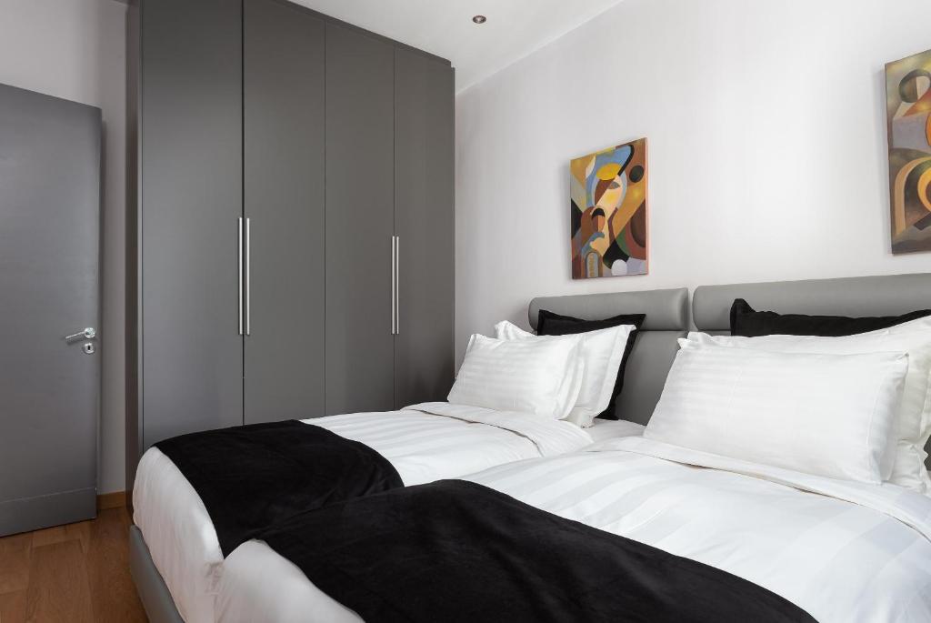 Posteľ alebo postele v izbe v ubytovaní Acropolis Elegant Penthouse