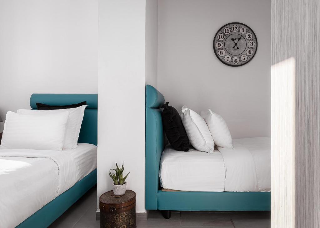 Posteľ alebo postele v izbe v ubytovaní Acropolis Elegant Penthouse