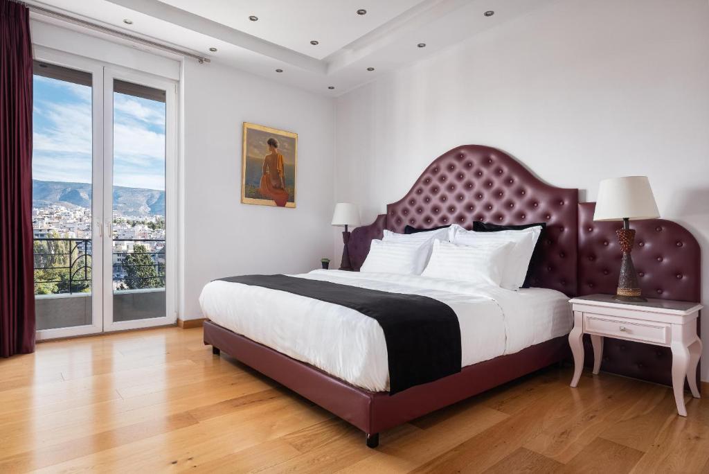 Posteľ alebo postele v izbe v ubytovaní Acropolis Elegant Penthouse