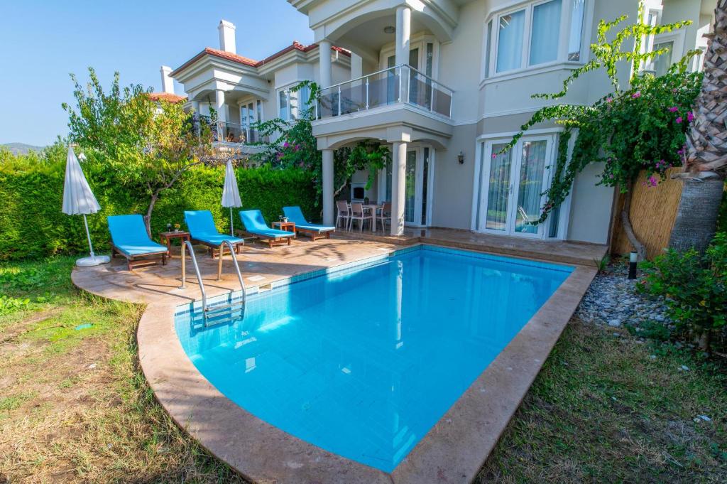 Bazén v ubytování Sunset Beach Villas and Apartments nebo v jeho okolí