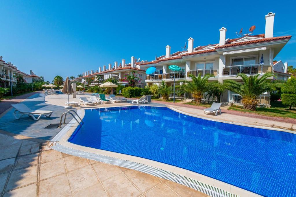 Bazén v ubytování Sunset Beach Villas and Apartments nebo v jeho okolí