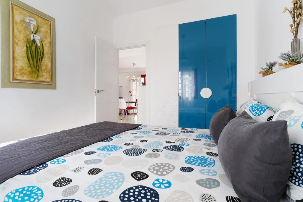 Łóżko lub łóżka w pokoju w obiekcie Bungalow Aloe Dunas 2