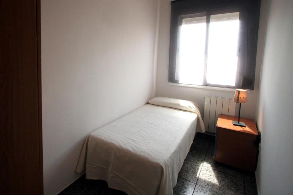 Posteľ alebo postele v izbe v ubytovaní Near Maresme Forum Apartment