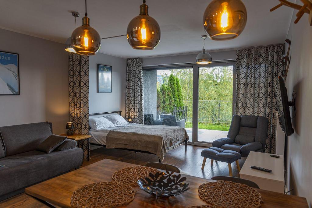 Posezení v ubytování VacationClub – Bukowa 17A Apartament E.1