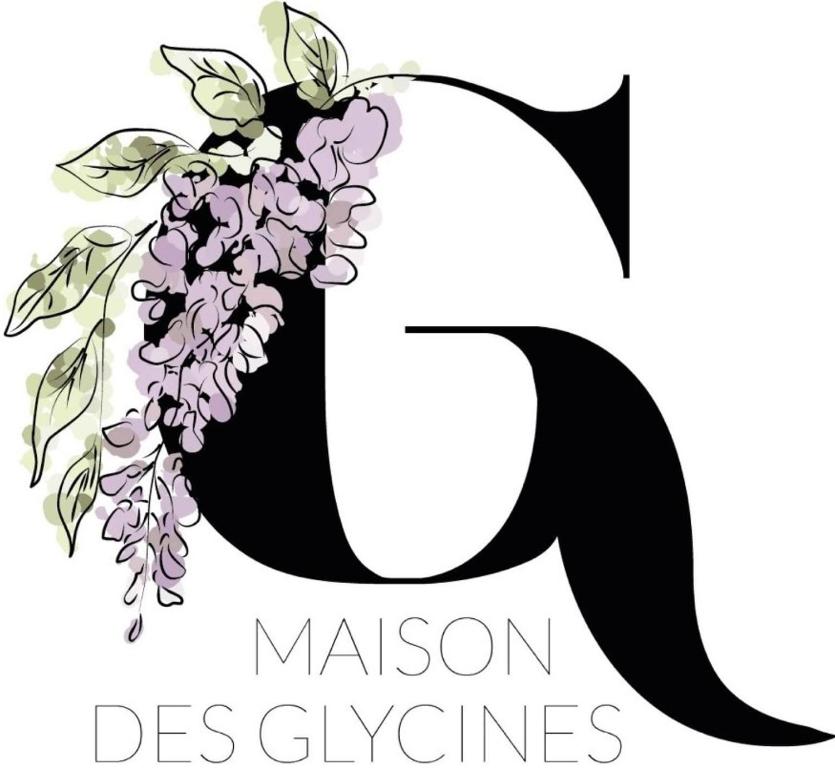 una carta con una corona de lilas en Maison Des Glycines, en Droux
