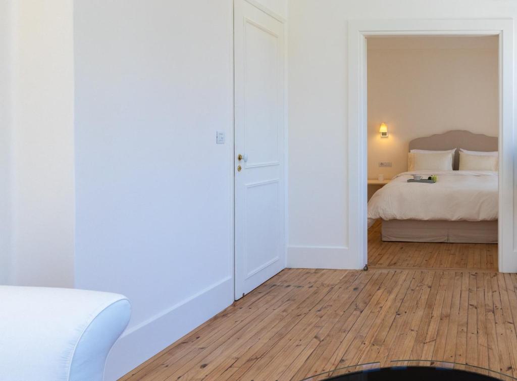 Posteľ alebo postele v izbe v ubytovaní Etoile Luxury Suites