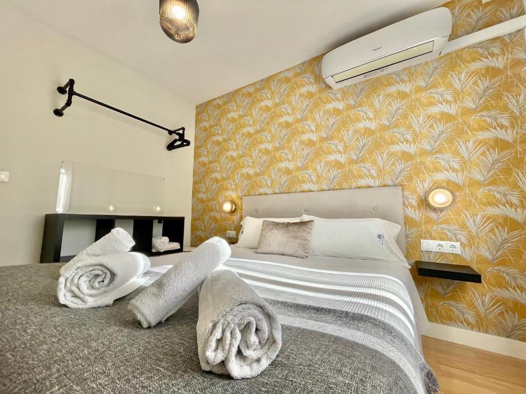 A bed or beds in a room at El balcón de la Mezquita