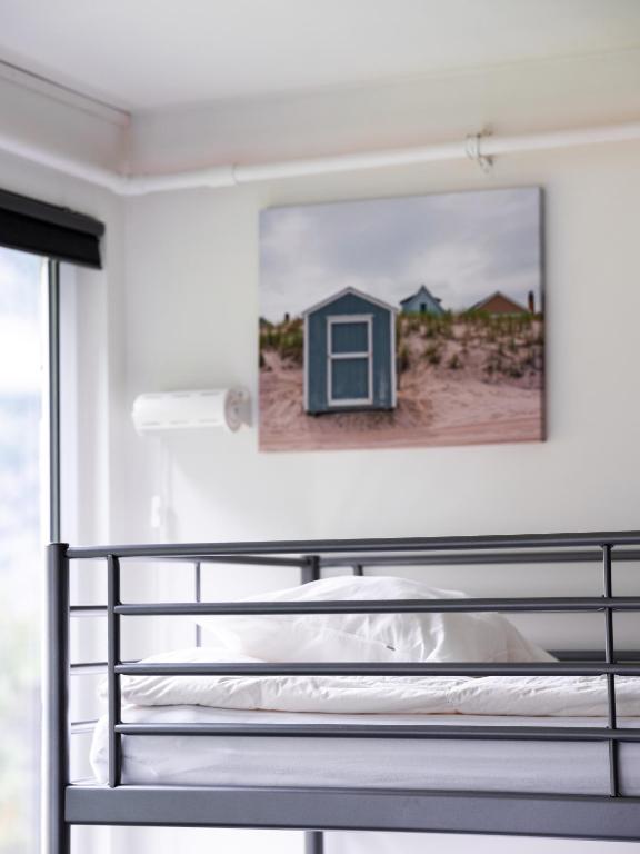 Postel nebo postele na pokoji v ubytování Trolltunga Hostel