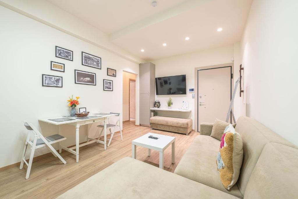 A television and/or entertainment centre at Panathenaic Stadium By Greece Apartments