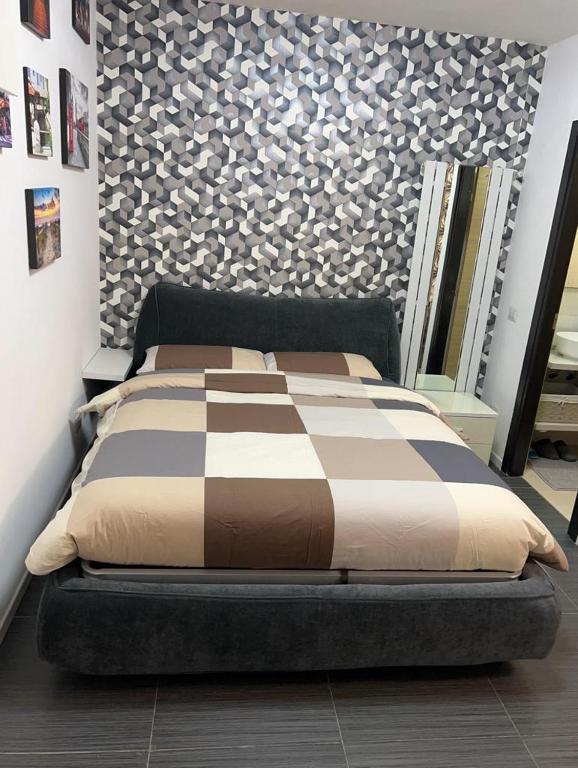 Postel nebo postele na pokoji v ubytování Apartment Tazzoli 11