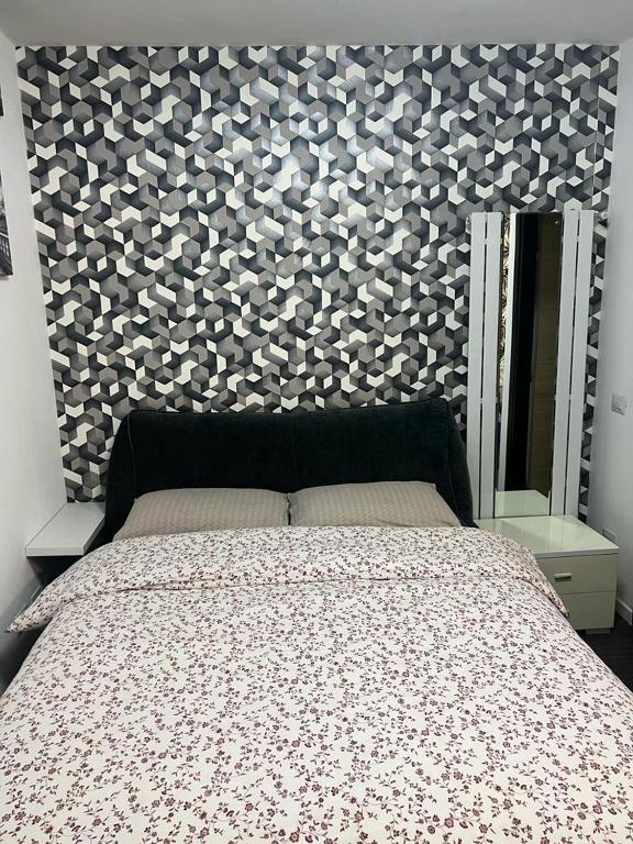 Postel nebo postele na pokoji v ubytování Apartment Tazzoli 11