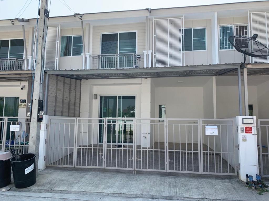 a building with a gate in front of it at Aileen House in Chiang Mai