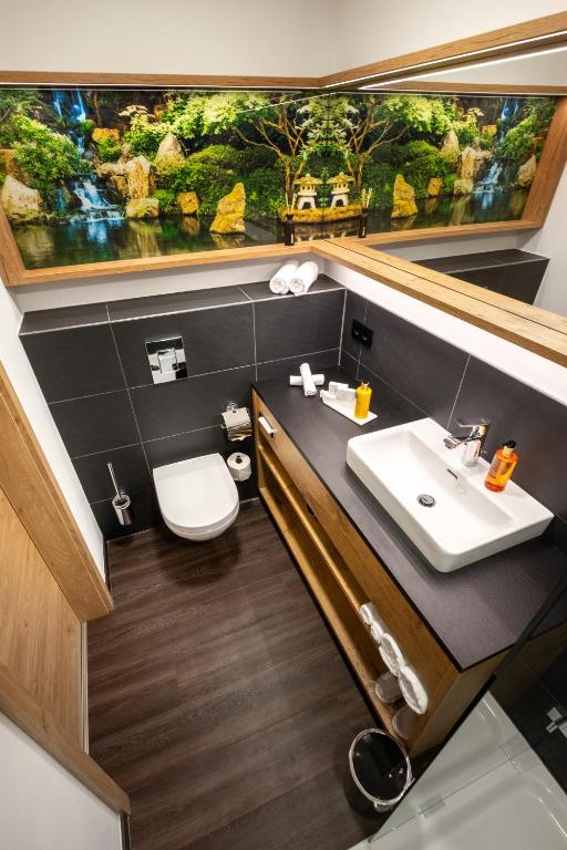 Koupelna v ubytování NASHI Rooms