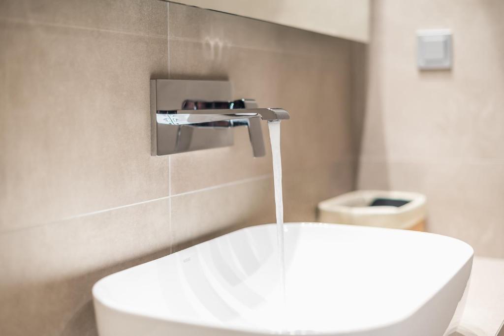 A bathroom at Panathenaic Stadium By Greece Apartments