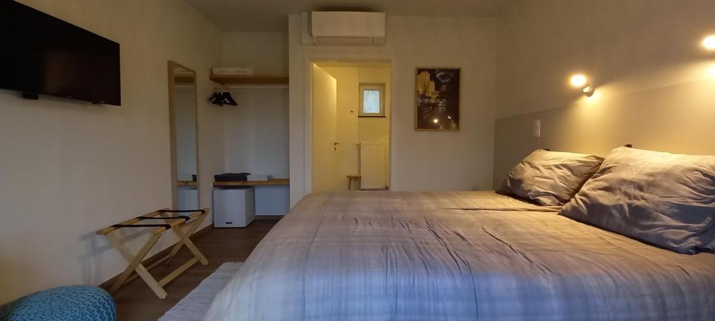 Postel nebo postele na pokoji v ubytování B&B Les Lits de Nohaipré