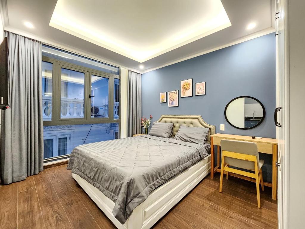 מיטה או מיטות בחדר ב-Golden Sun Hotel Apartments