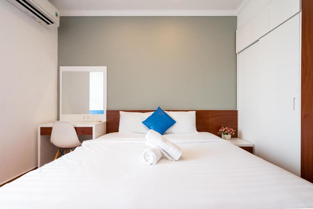 Postel nebo postele na pokoji v ubytování Goby home in Rivergate Luxury Apartment - near Ben Thanh market