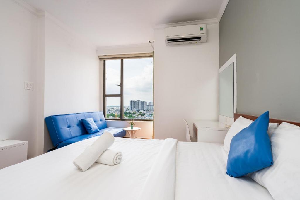 Postel nebo postele na pokoji v ubytování Goby home in Rivergate Luxury Apartment - near Ben Thanh market