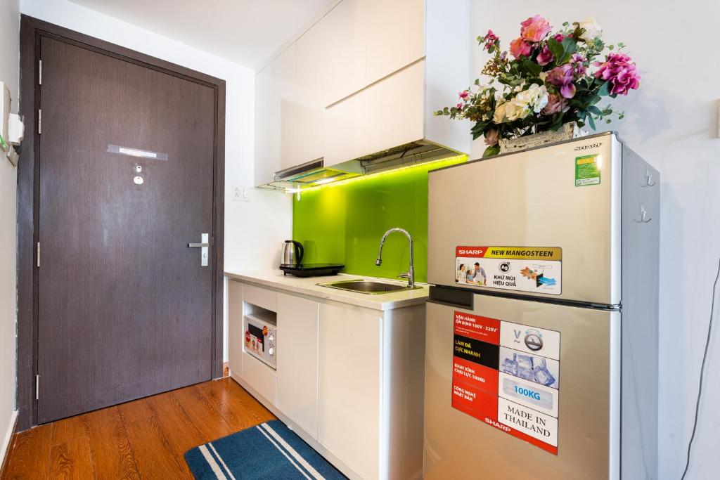 Kuchyň nebo kuchyňský kout v ubytování Goby home in Rivergate Luxury Apartment - near Ben Thanh market