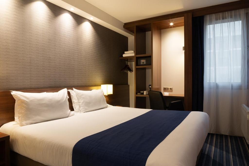 Postel nebo postele na pokoji v ubytování Holiday Inn Express Amiens by IHG
