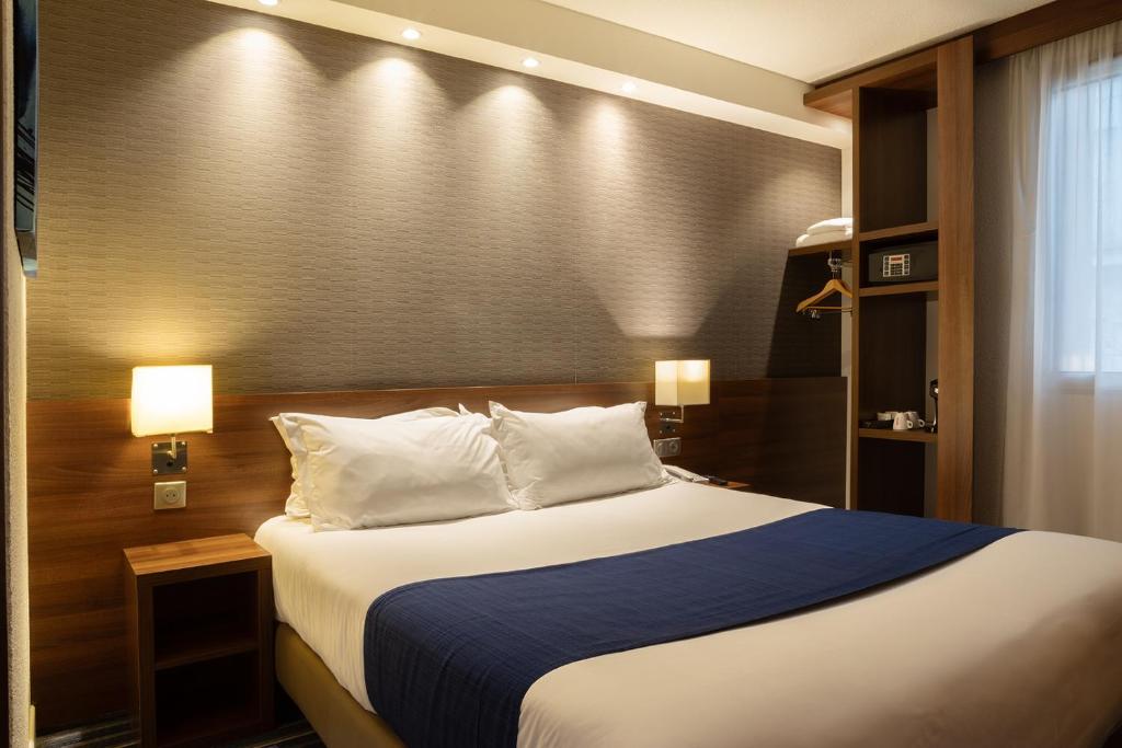 Postel nebo postele na pokoji v ubytování Holiday Inn Express Amiens by IHG