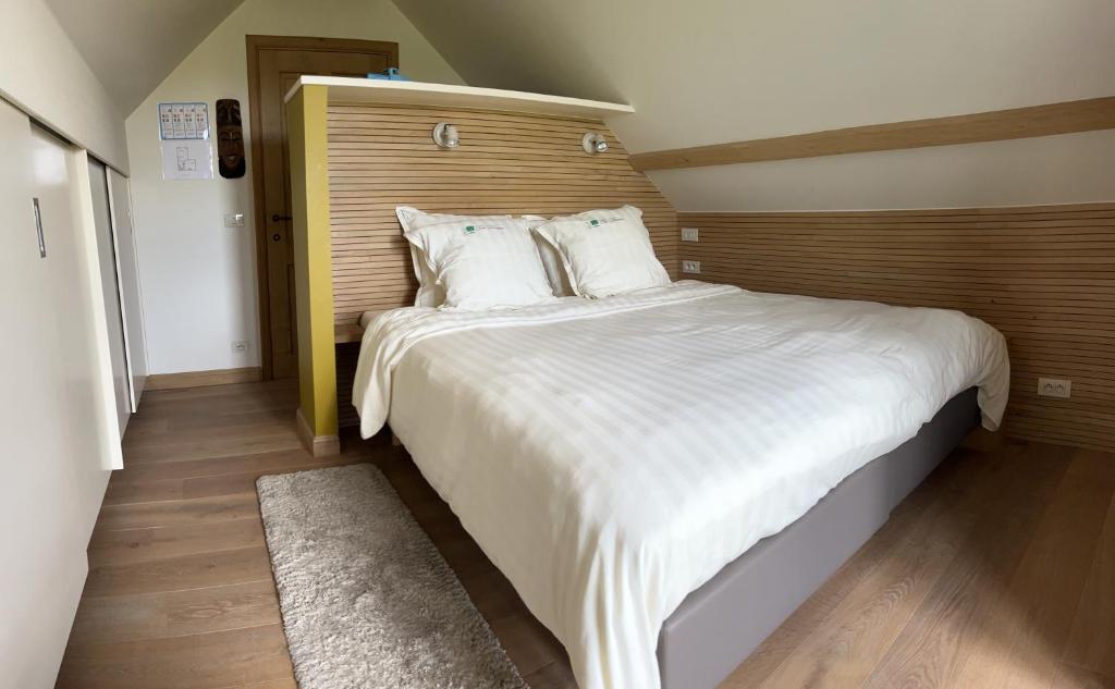 Postel nebo postele na pokoji v ubytování Vakantiewoning - Ter Douve