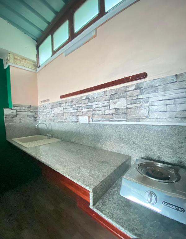 Kuchyň nebo kuchyňský kout v ubytování La Rosedepine chez Mariani chez l'habitant